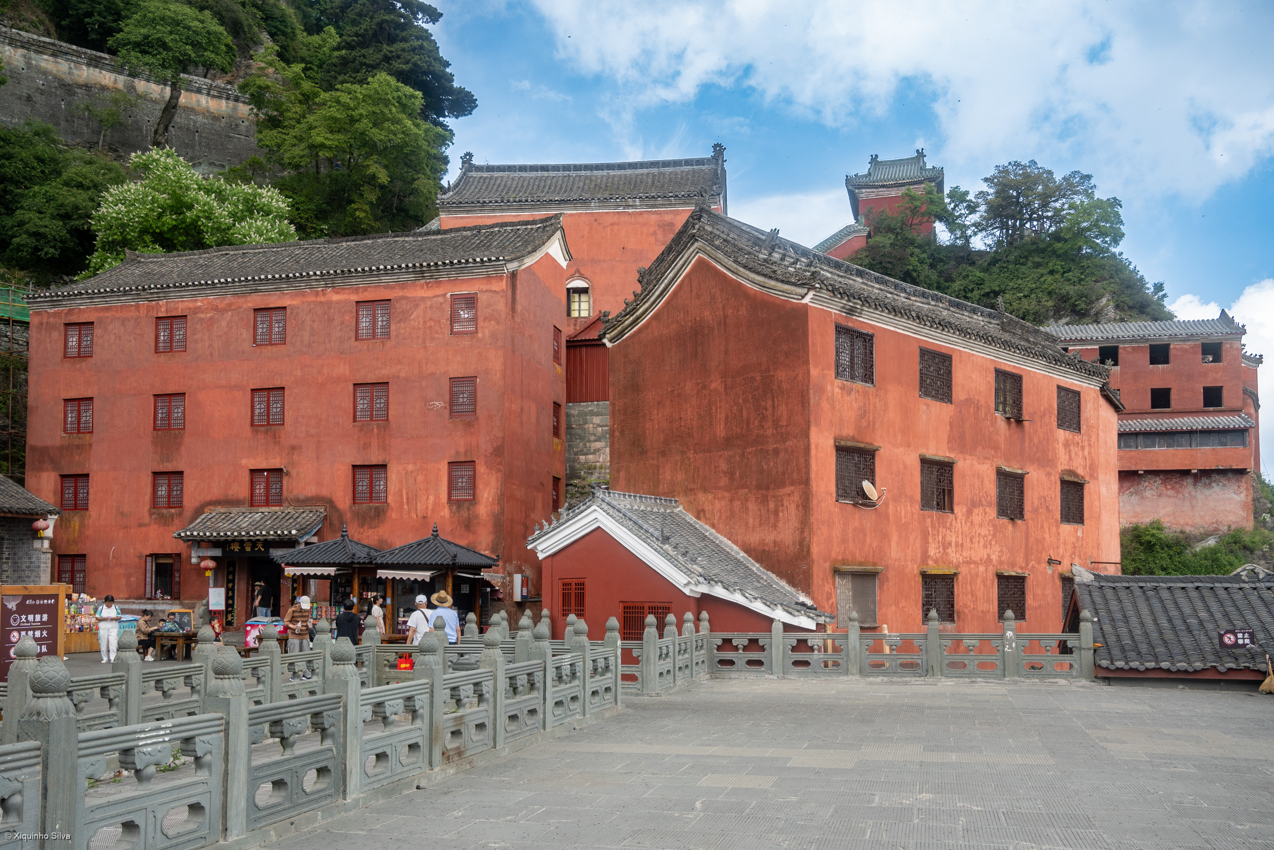 Nanyan Palace, built into the cliff face, exemplifying the harmony between architecture and nature.