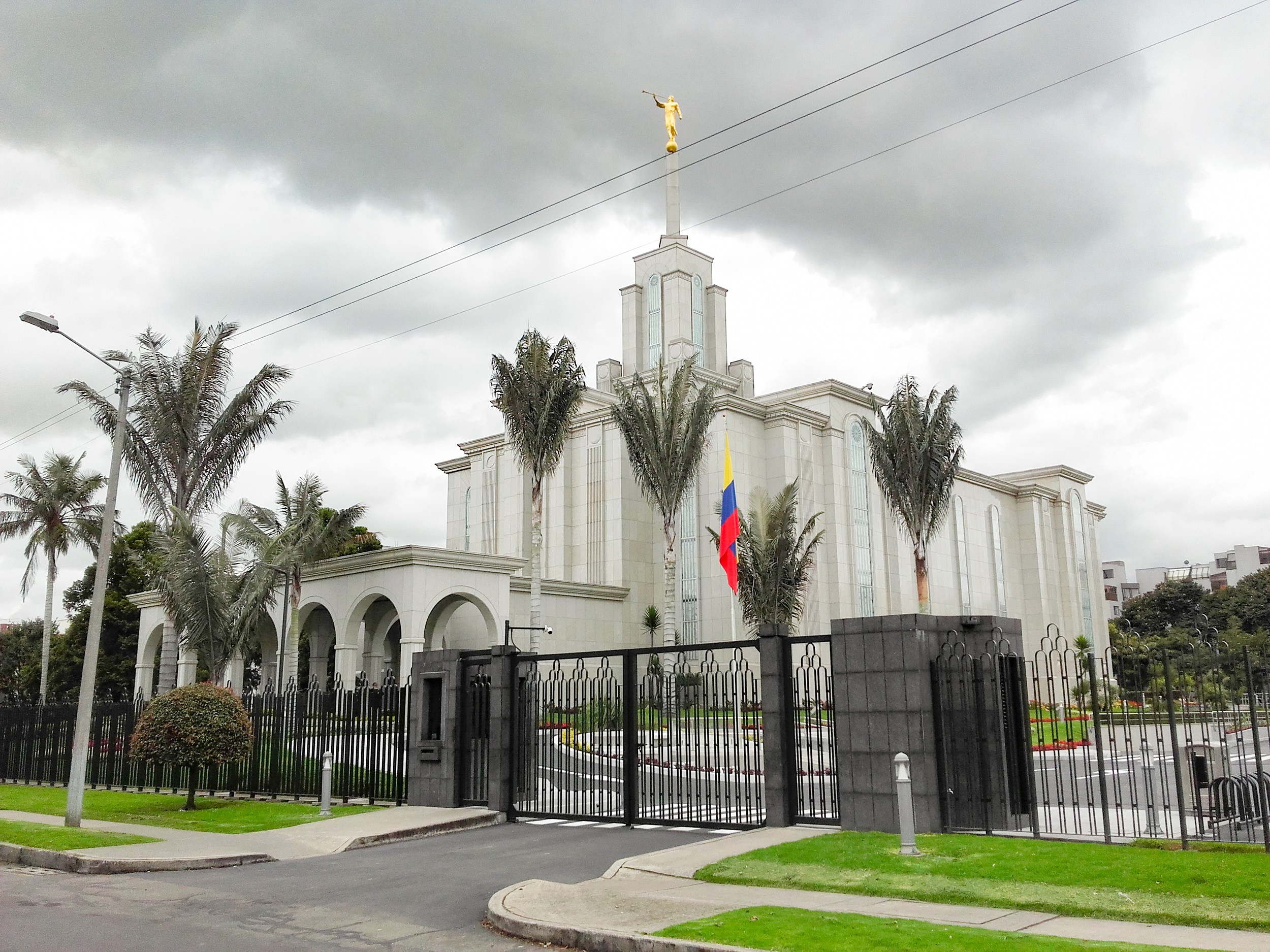 The Bogotá Colombia Temple illuminated at dusk, showcasing its beauty.