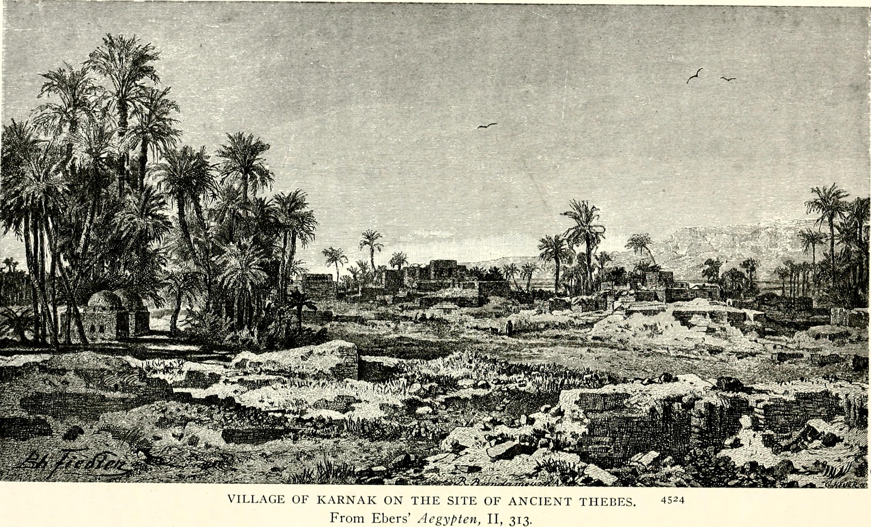 Aula Besar Hipostil di Kuil Karnak, menampilkan pilar-pilar besar.