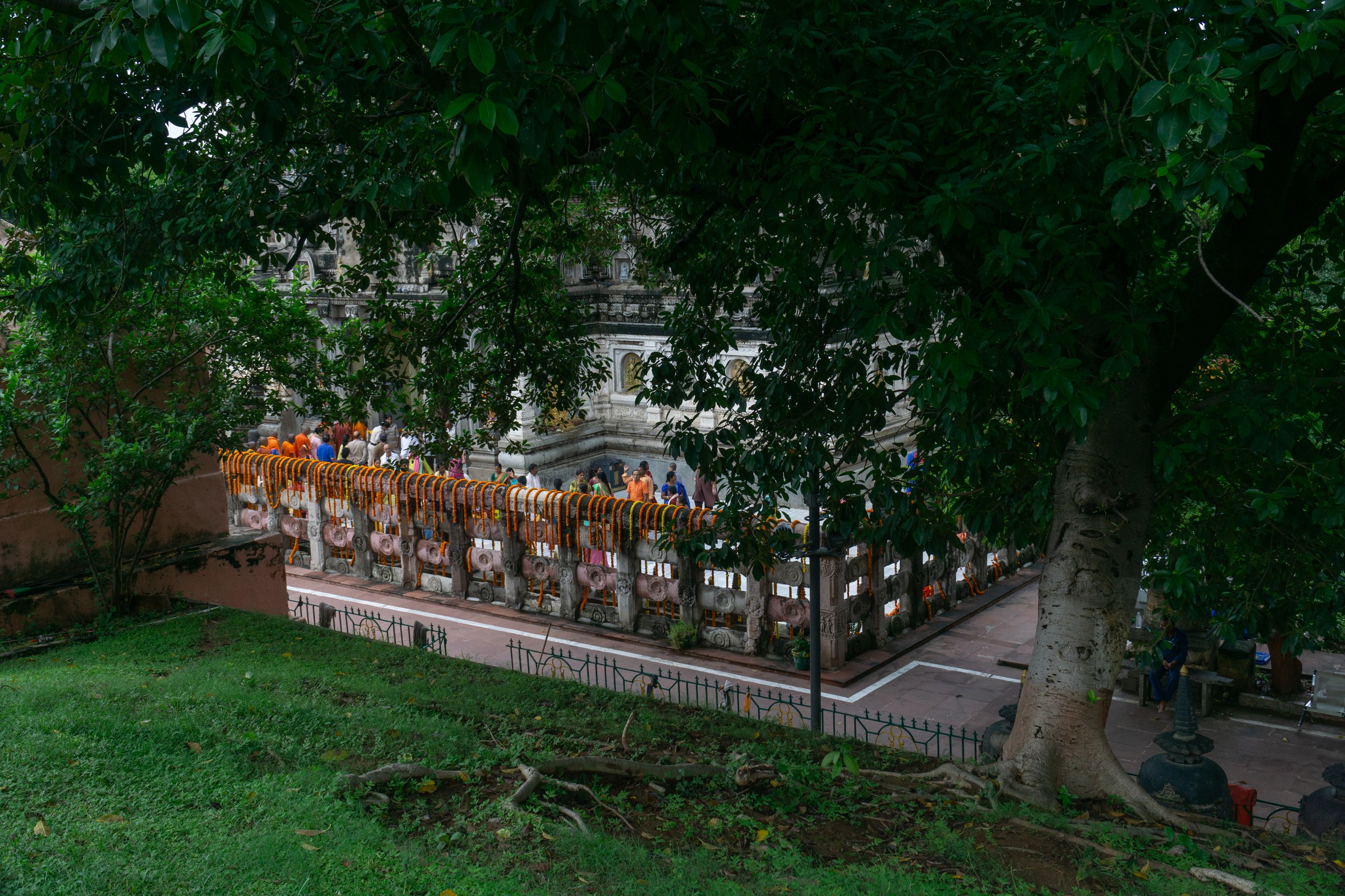 Colorful prayer flags fluttering in the wind, adding to the spiritual ambiance.
