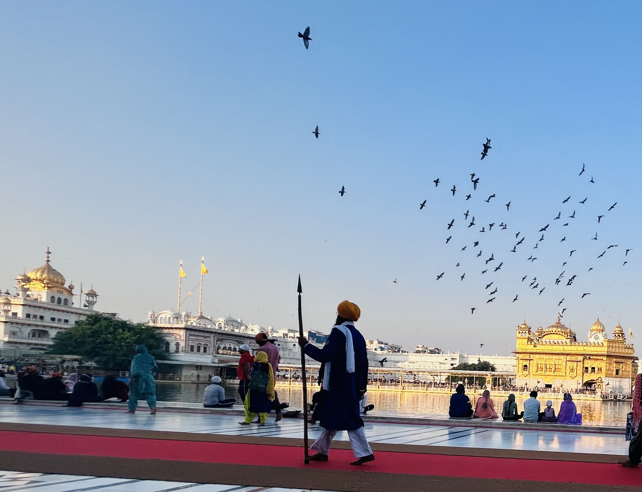 Devotees praying inside the Golden Temple.