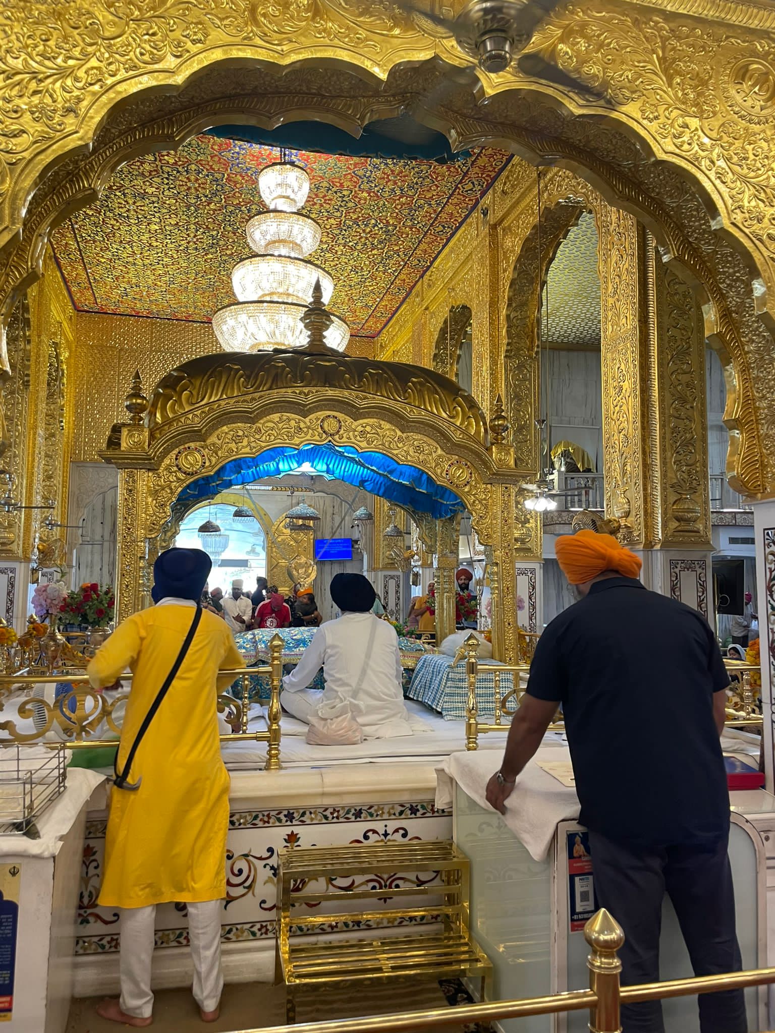 The golden dome of Gurdwara Bangla Sahib, a symbol of spiritual divinity.