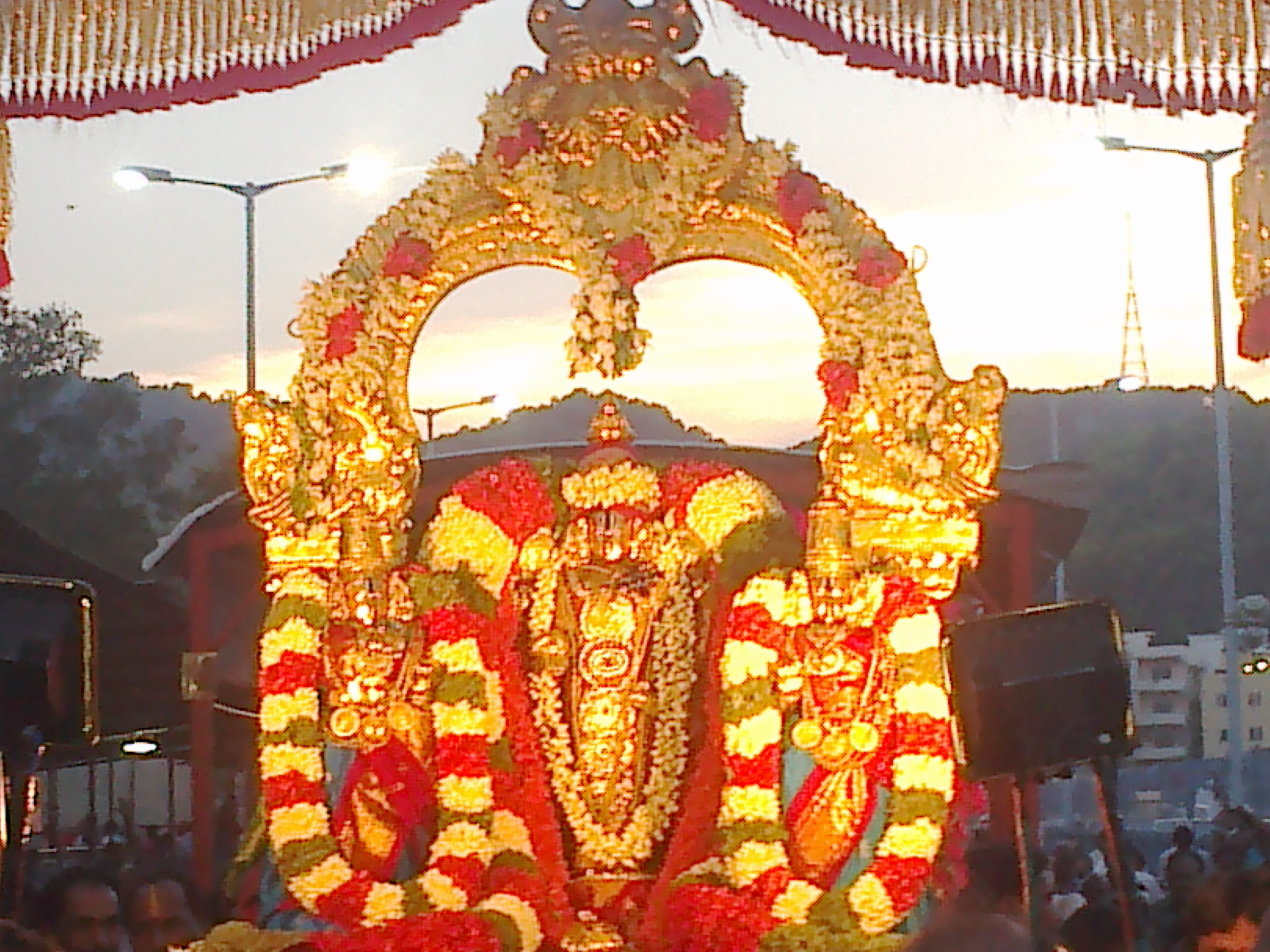 The main entrance of the Temple of Seven Hills, adorned with a towering gopuram.