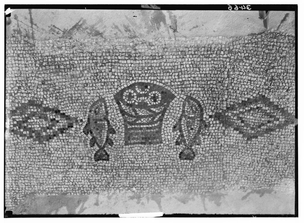 Ancient mosaic preservation within the modern structure.