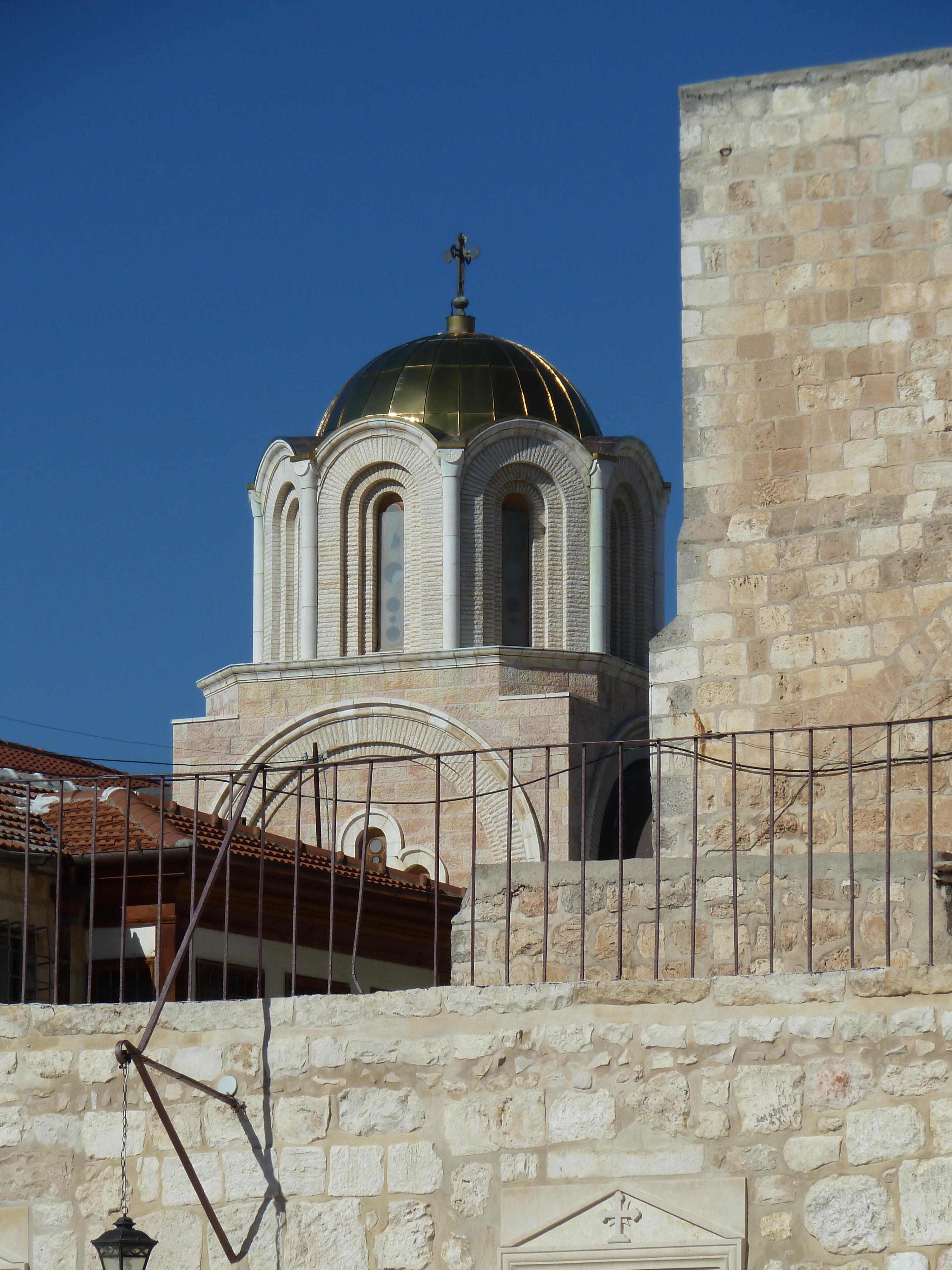 Intricate mosaics adorn the walls of the Church, depicting biblical scenes and saints.