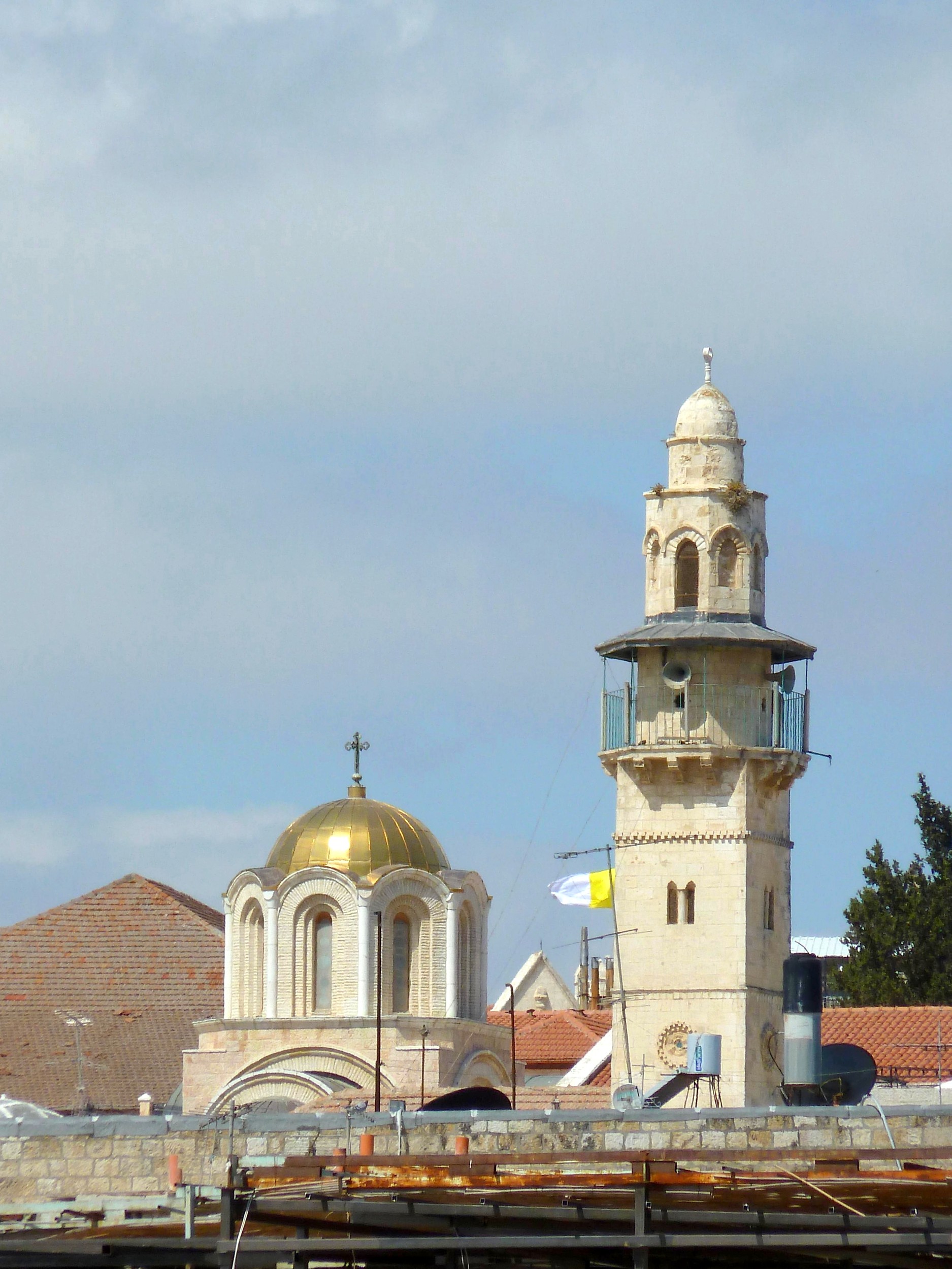 Candles illuminate the sacred spaces within the Church, creating a spiritual ambiance.