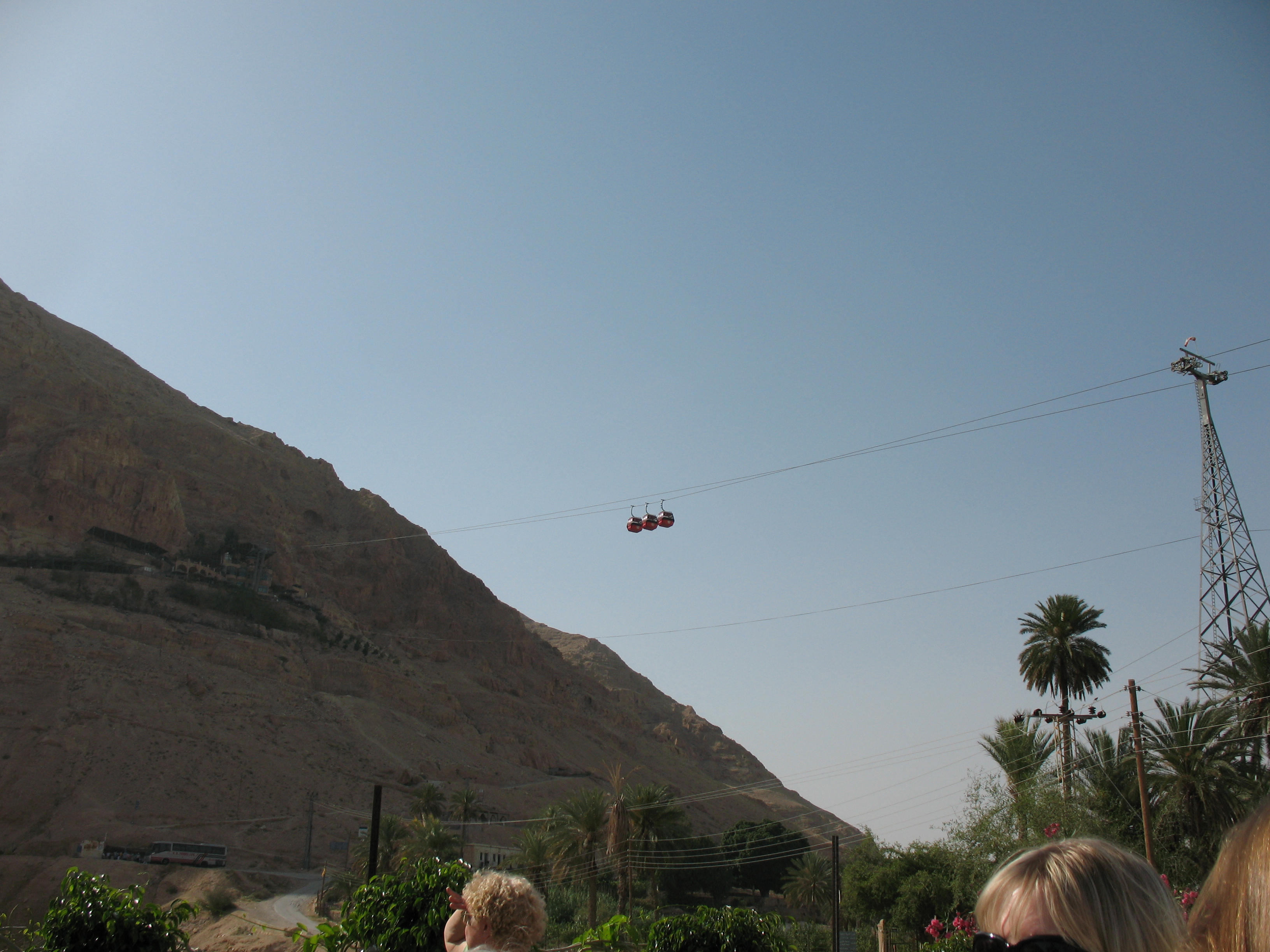 The Mount of Temptation at sunset, casting a golden glow over the landscape.