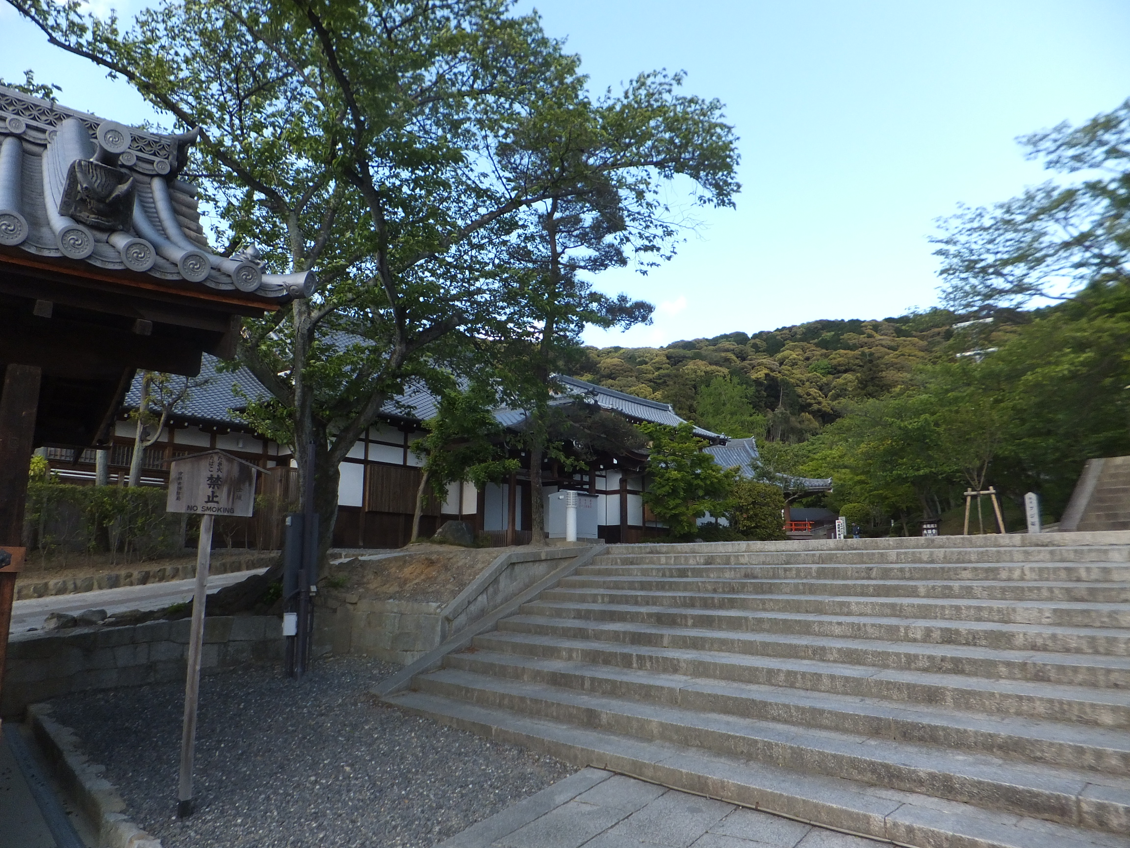 The vibrant three-storied pagoda, a prominent feature of the temple complex.