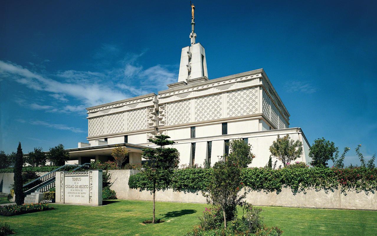 The temple illuminated at night.