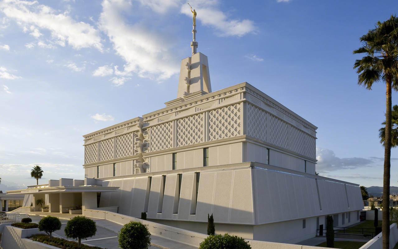 The temple reflecting in a pool of water.