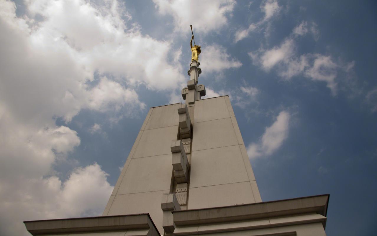 The temple surrounded by lush greenery.