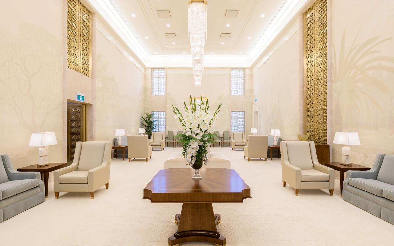 The Hamilton New Zealand Temple reflecting in a nearby pond.