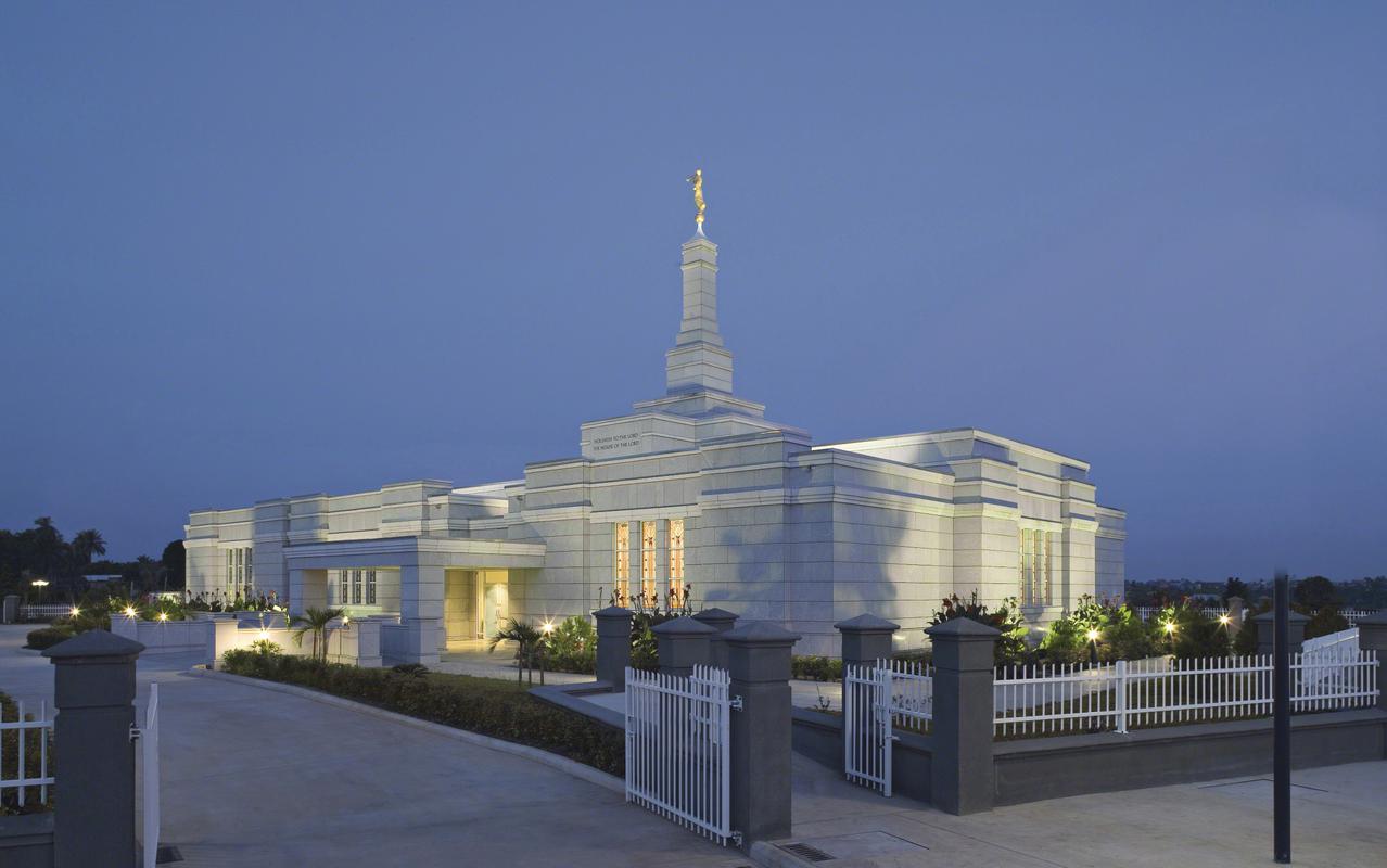 The Aba Nigeria Temple surrounded by lush greenery.