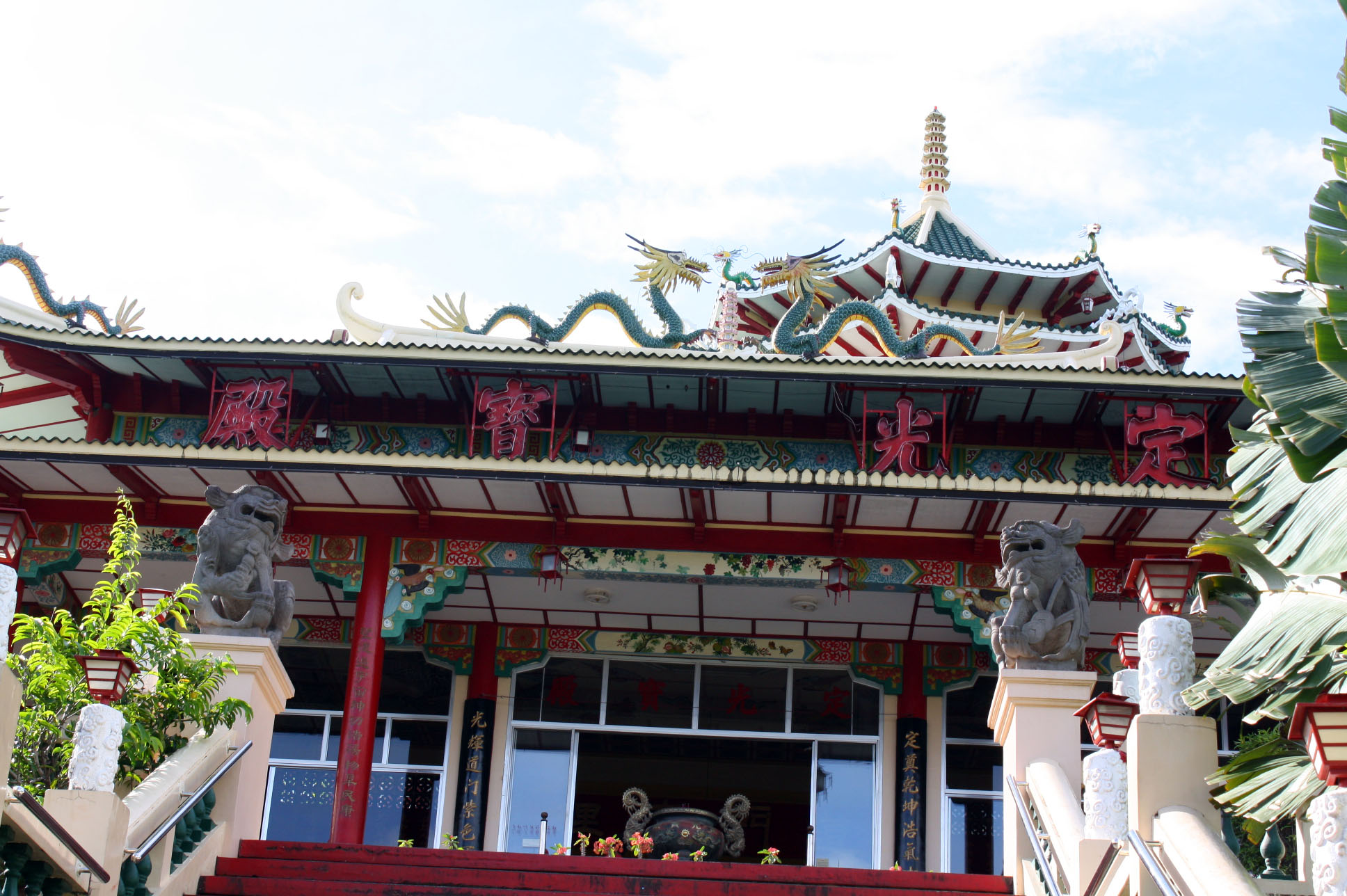 Pagoda-style roofs adorned with dragon statues
