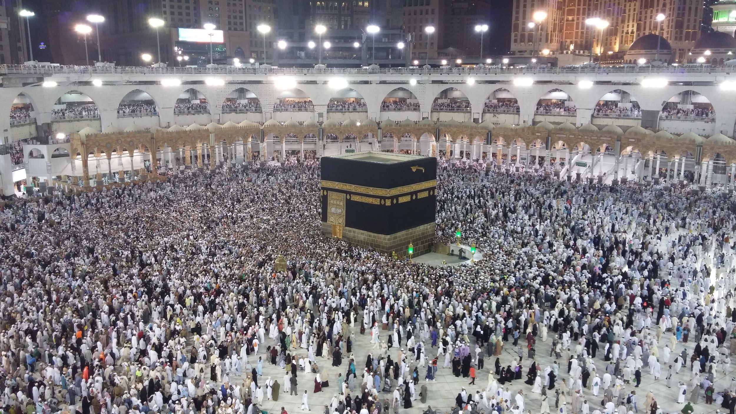 The Kaaba draped in the kiswa, a black cloth with gold inscriptions.