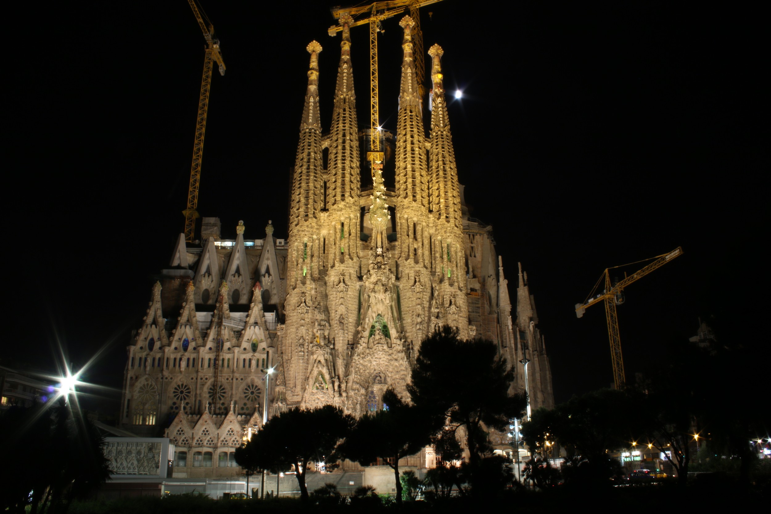 Illuminated at night, showing the Nativity Facade