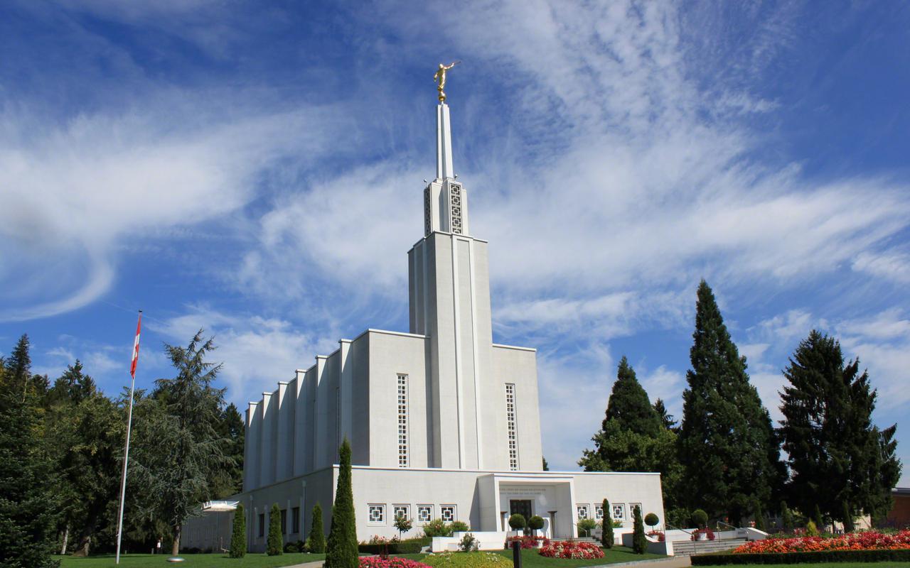 The Bern Switzerland Temple surrounded by trees.
