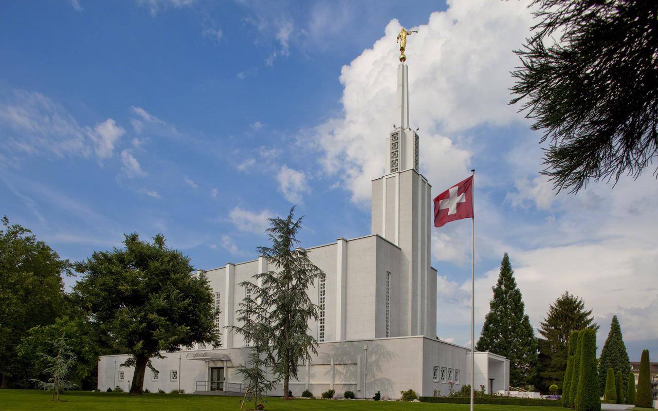 The Bern Switzerland Temple with a blue sky.