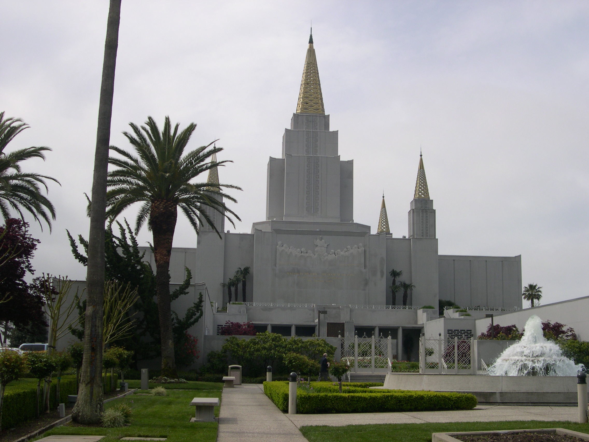 The grand entrance of the Oakland California Temple, featuring mid-century modern design elements.