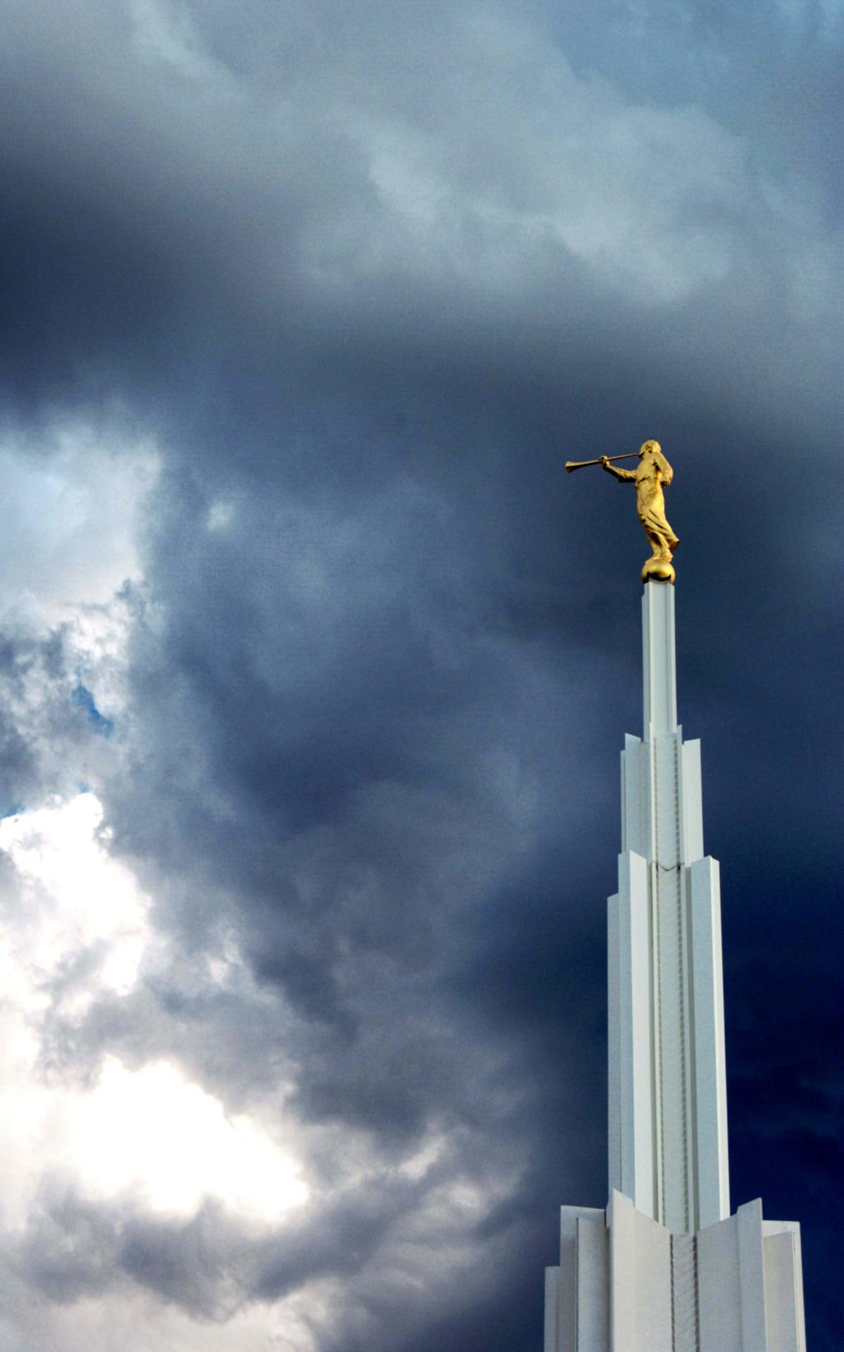 The temple illuminated at night, its landscape lighting beloved by the surrounding neighborhood.
