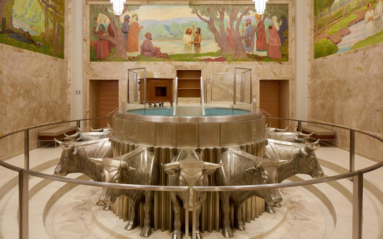 The temple surrounded by trees, blending with nature.