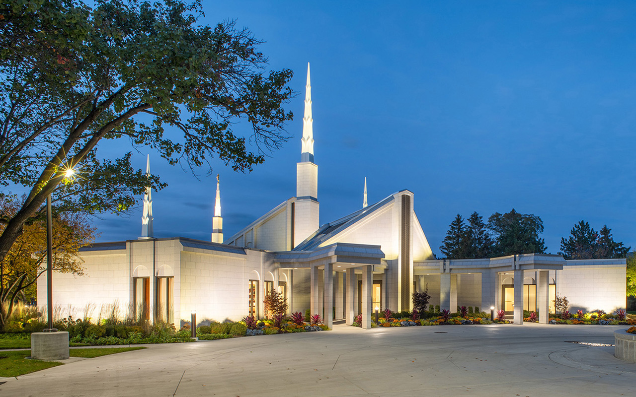 The Chicago Illinois Temple with its six spires rising above the Glenview tree canopy.