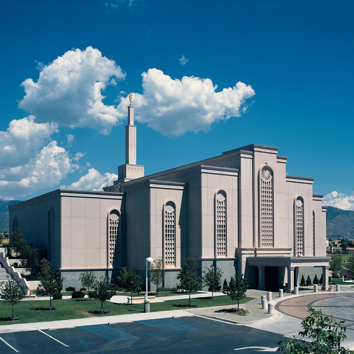 A peaceful fountain enhances the temple's entrance.