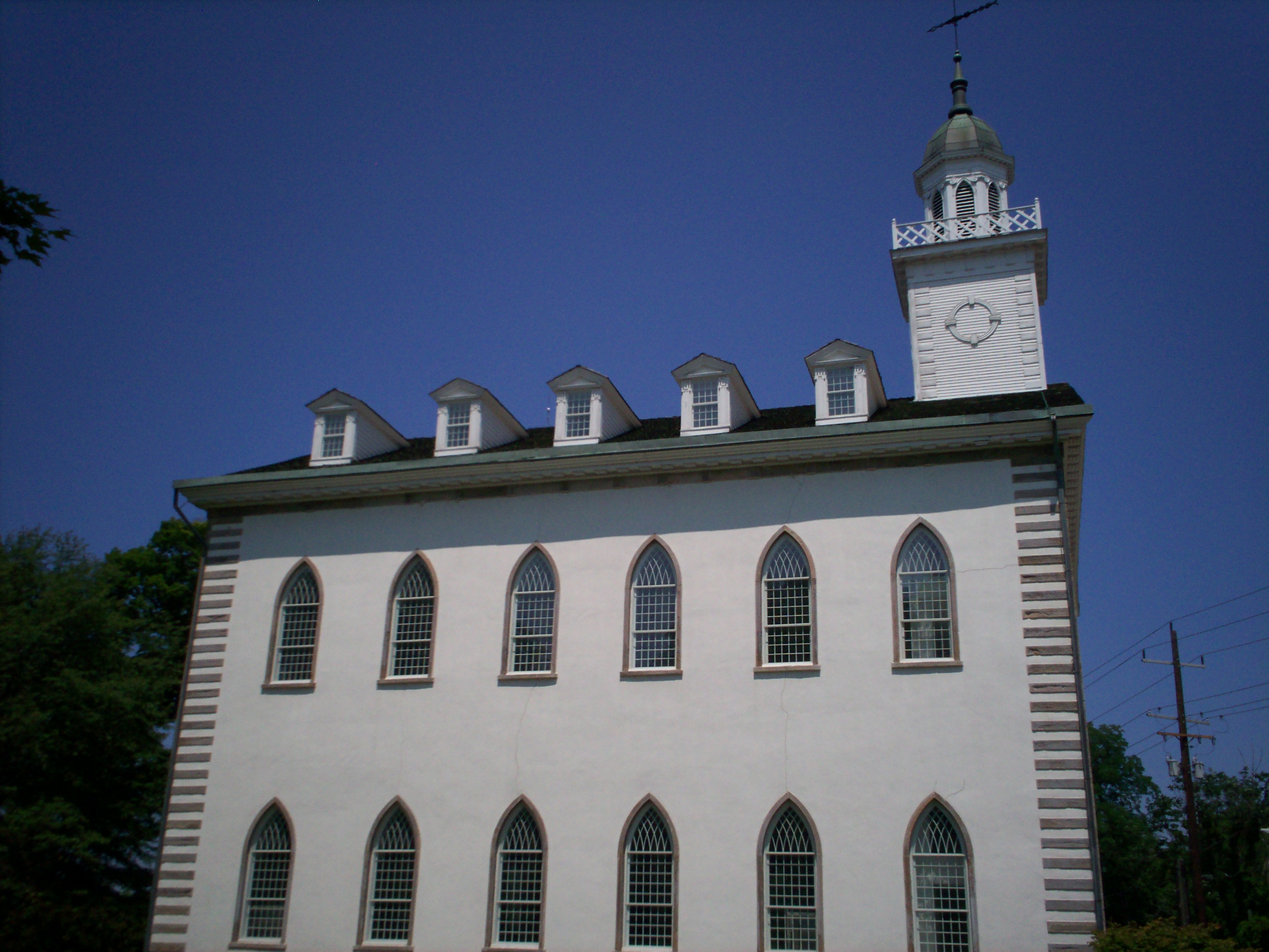 The Kirtland Temple stands on a bluff overlooking the Chagrin Valley.