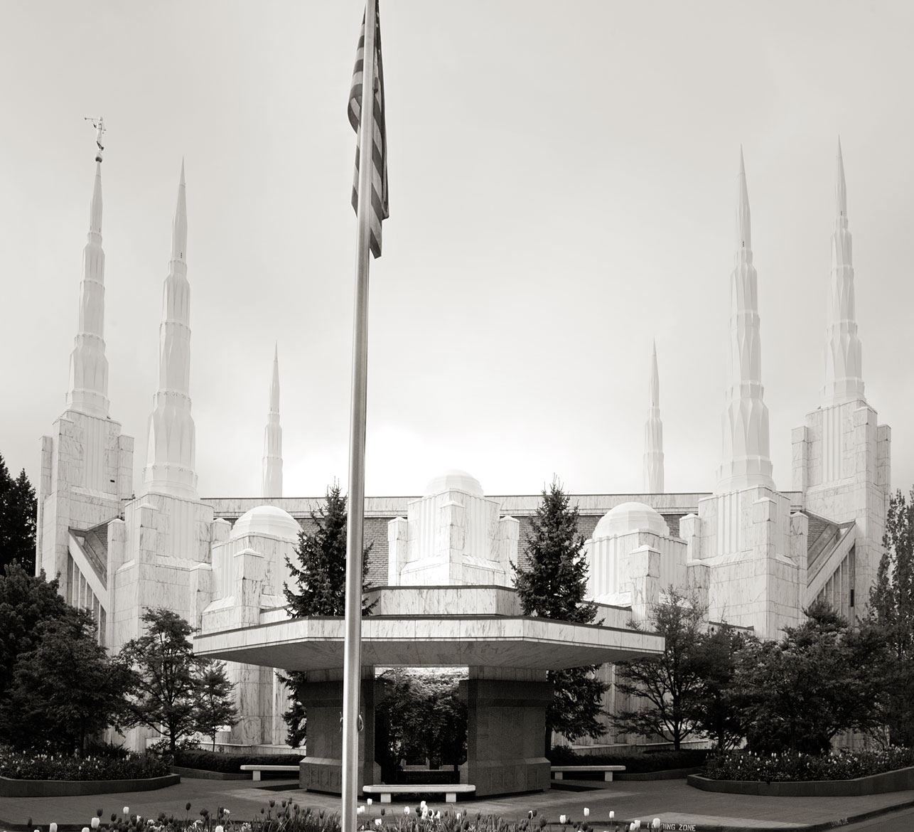 The Portland Oregon Temple with its six spires and American flag