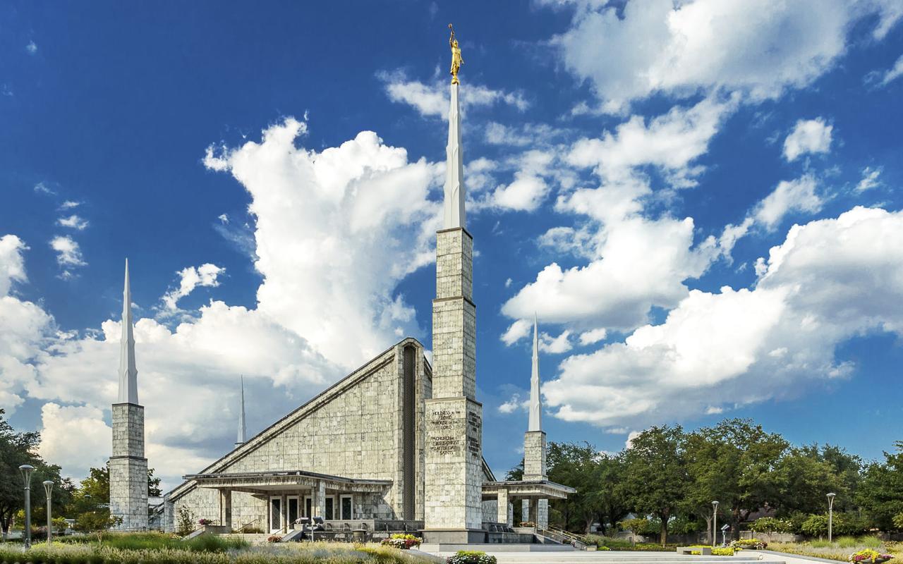 The peaceful garden setting surrounding the temple, inviting quiet reflection.