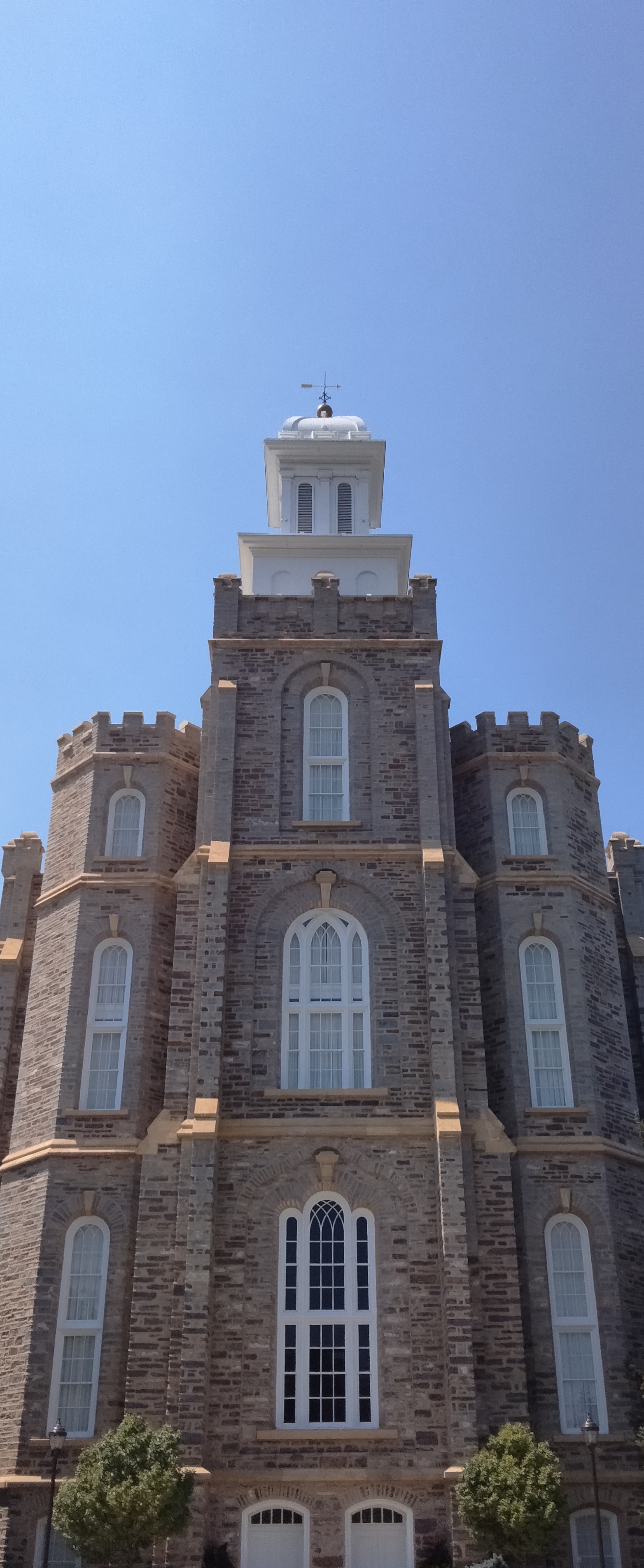 Looking up at the castellated towers and starstones