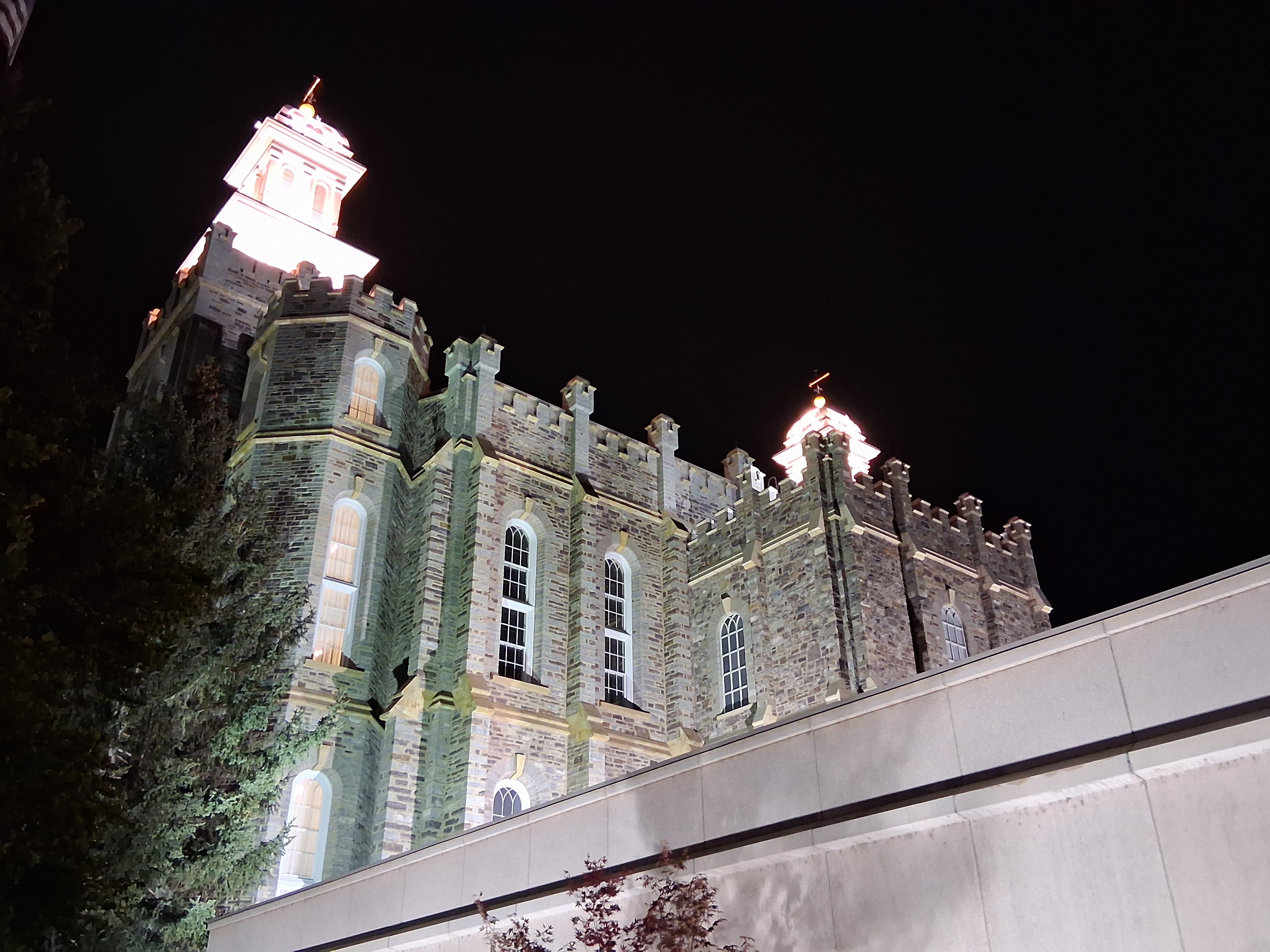 Illuminated at night against the Bear River Mountains