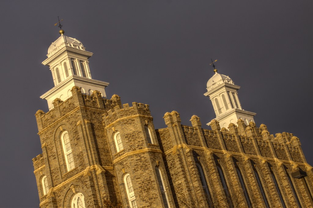 Temple bathed in golden sunset light