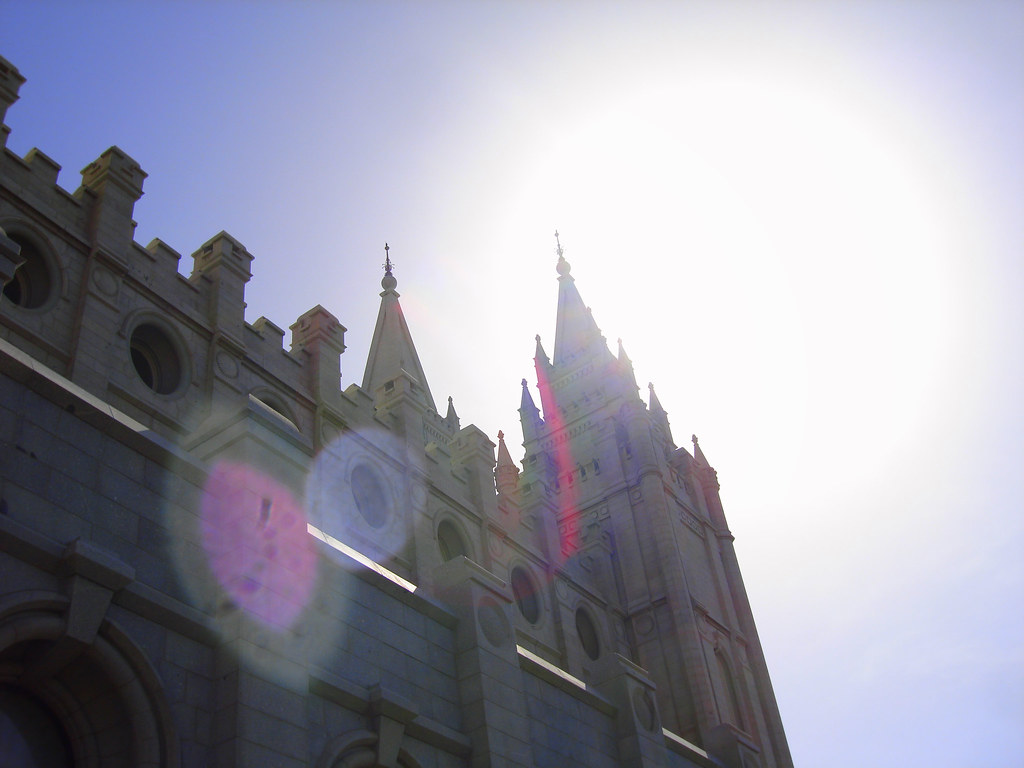 Dramatic sun flare behind the spires